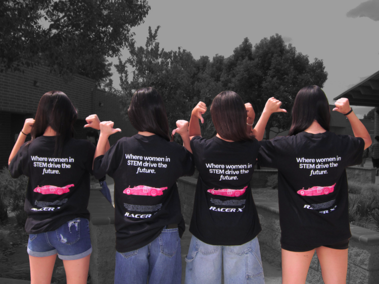Racer X² members flexing in their team shirts